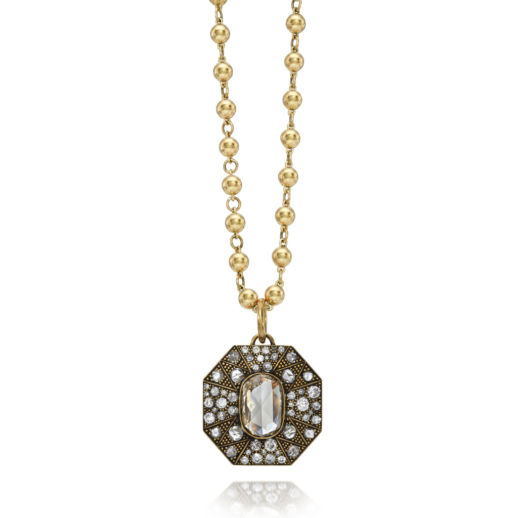 Single Stone's IVY pendant  featuring 5.93ct GIA certified Fancy Brown-Yellow/I2 oval rose cut diamond with 3.23ctw varying old, rose and round brilliant cut diamonds prong set in a handcrafted, oxidized 18K yellow gold pendant.
