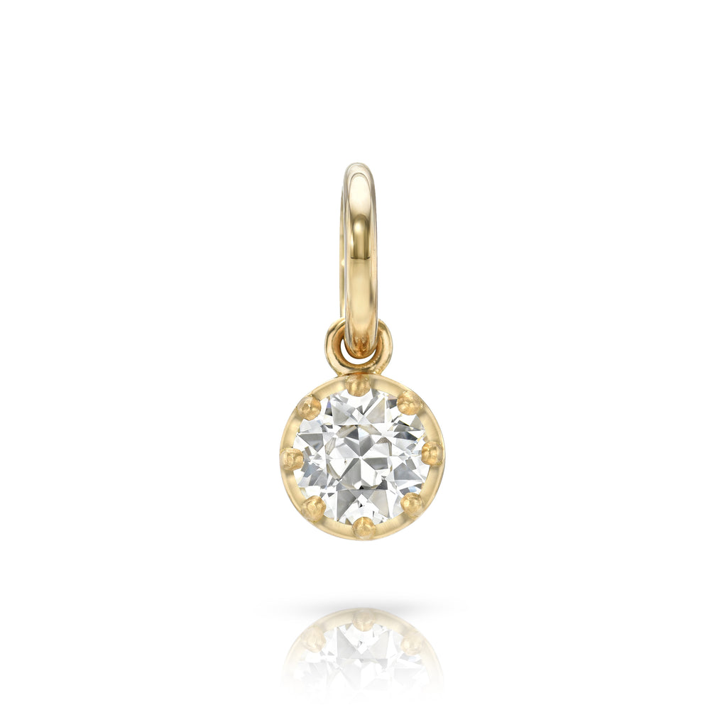 
Single Stone's Polly pendant  featuring 0.75ct L/VS2 GIA certified old European cut diamond prong set in a handcrafted 18K yellow gold drop pendant.
