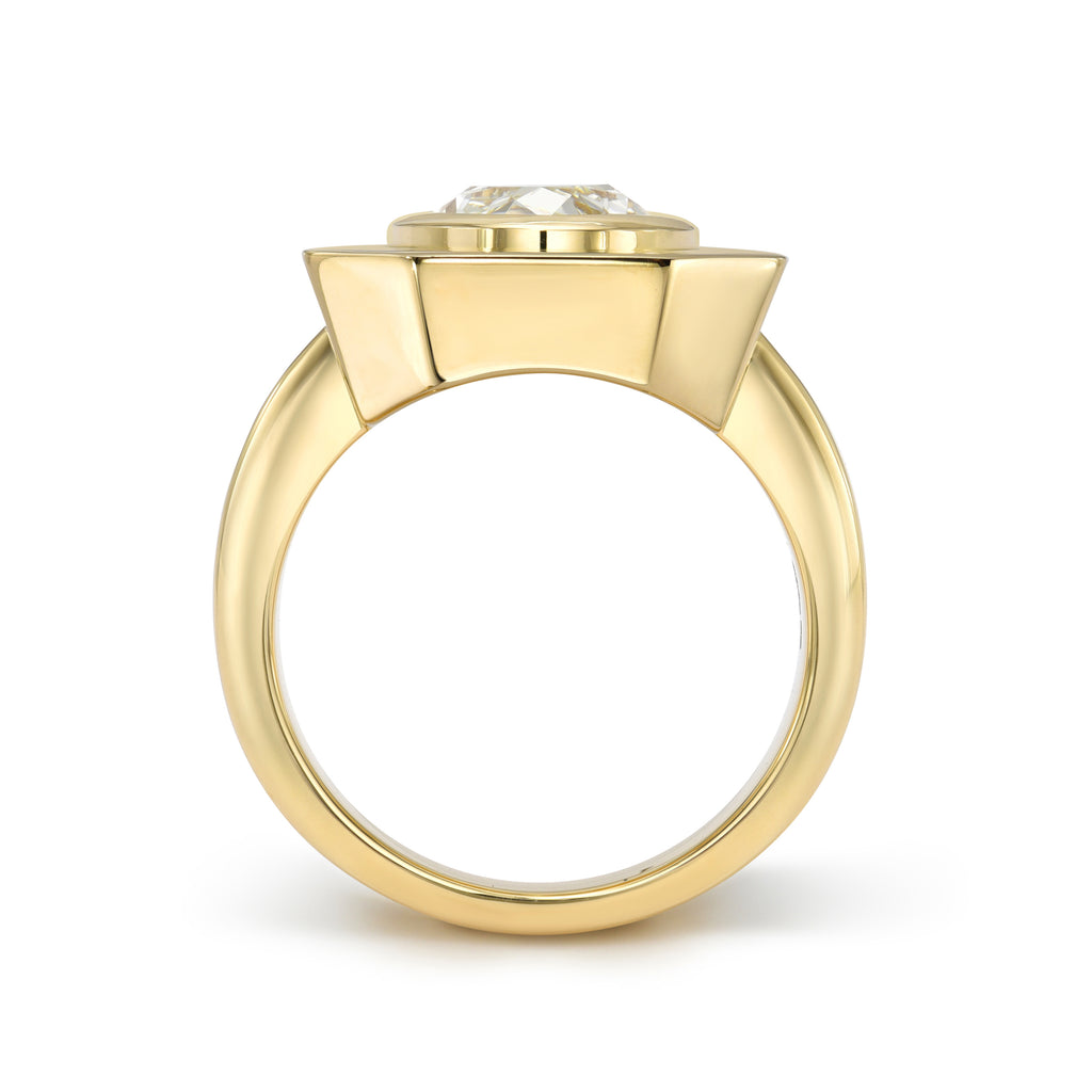 Single Stone's RENA ring  featuring 3.11ct N/SI2 GIA certified moval cut diamond bezel set in a handcrafted 18K yellow gold mounting.
