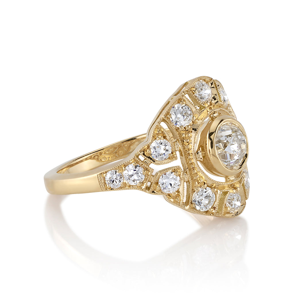 Single Stone's RENEE ring  featuring 0.52ct J/VS2 GIA certified old mine cut diamond with 0.63ctw old European cut accent diamonds set in a handcrafted 18K yellow gold mounting.
