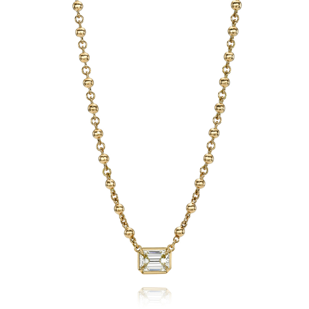 
Single Stone's Rosalina necklace earrings  featuring 2.02ct S-T/VS2 GIA certified emerald cut diamond prong set on our handcrafted 18K yellow gold Rosary chain.
Necklace measures 17".
