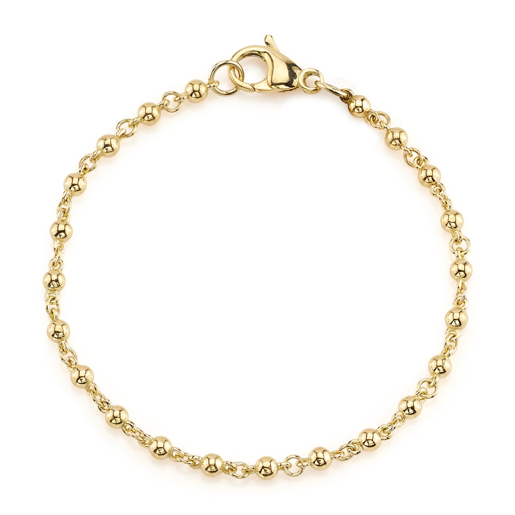 
Single Stone's Rosary bracelet band  featuring Handcrafted 18K yellow gold round ball bracelet. Bracelet measures 7.5".
Please inquire for additional customization. 
