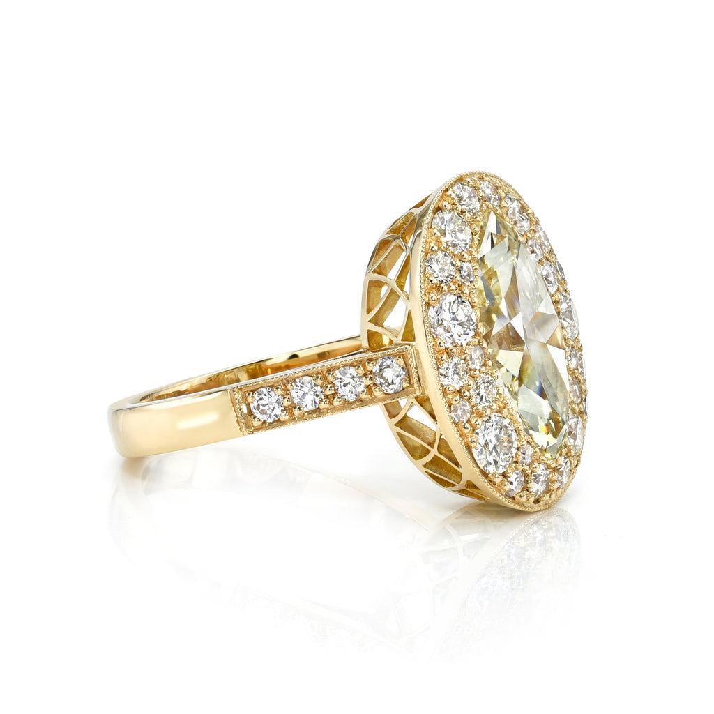 Single Stone's SERAFINA ring  featuring 2.75ct N/SI1 GIA certified moval cut diamond amongst 0.96ctw mixed cut diamonds cobblestone set in a handcrafted 18K yellow gold mounting.
