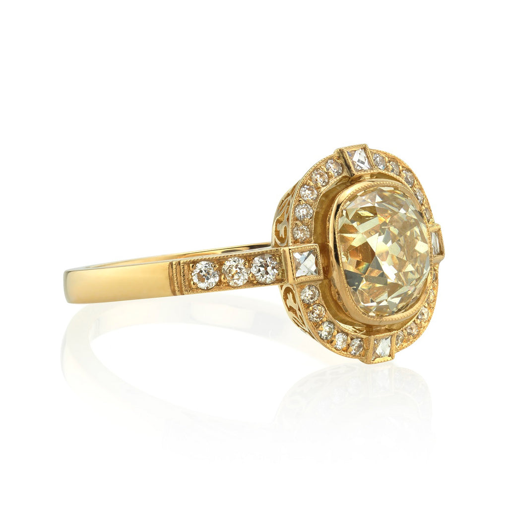 Single Stone's SHANNA ring  featuring 1.73ct K/SI1 EGL certified antique cushion cut diamond with 0.18ctw old European cut accent diamonds and 0.06ctw French cut accent diamonds set in a handcrafted 18K yellow gold mounting.
