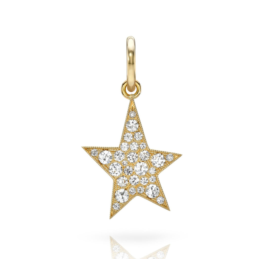 Single Stone's SMALL KINSLEY pendant  featuring Handcrafted 18K yellow gold star pendant. Available in a polished or cobblestone set diamond finish. Cobblestone finish features approximately 0.55ctw G-H/VS old European cut diamonds. Charm measures 16mm x 23mm. Price does not include chain.

