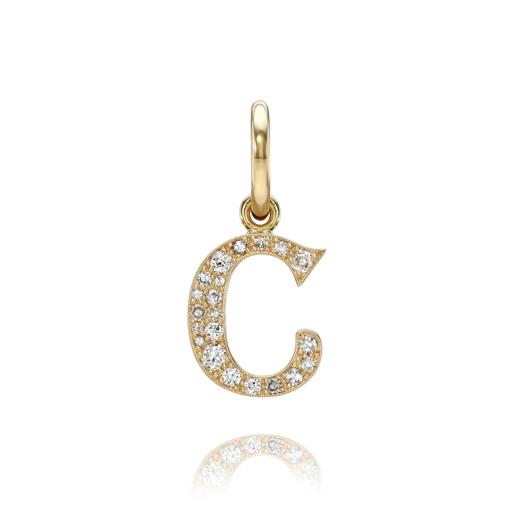 Single Stone's SMALL COBBLESTONE LETTERS pendant  featuring Approximately 0.15ctw-0.60ctw varying old and round brilliant cut diamonds set in a handcrafted 18K yellow gold letter pendant. Letters are approximately 1/2&quot; tall. Available in an oxidized or polished finish. Please inquire for additional customization. Price does not include chain, and may vary according to stone wei
