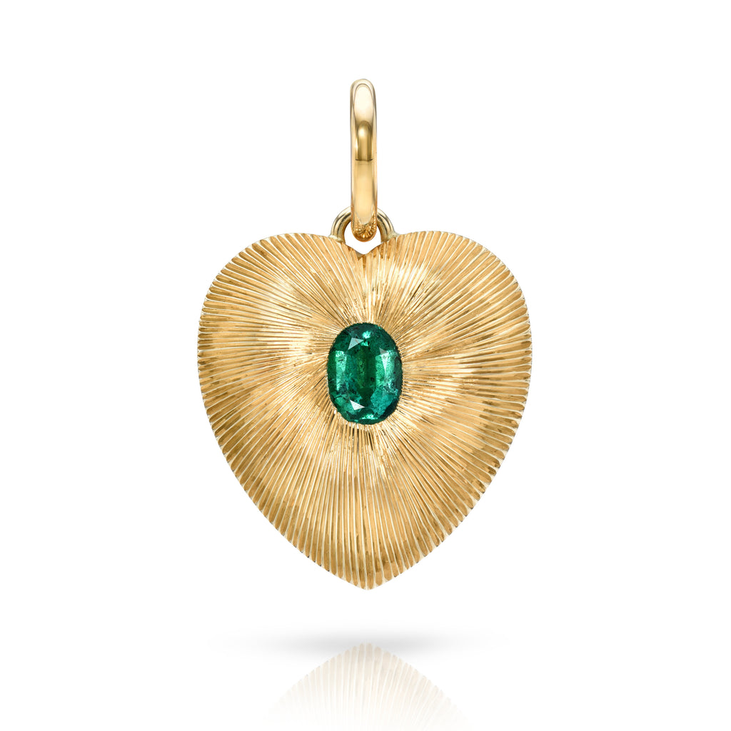 
Single Stone's Small valentina with gemstone pendant  featuring 0.75ct oval cut green emerald set in a handcrafted 18K yellow gold heart-shaped pendant.
Price does not include chain.
