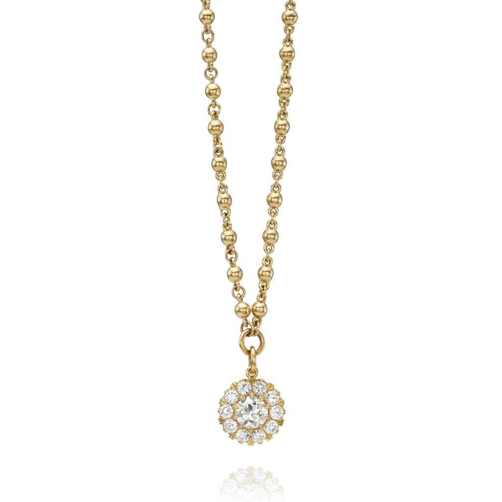 
Single Stone's Talia necklace  featuring 1.05ct M/SI1 GIA certified old European cut diamond with 1.00ctw old European cut accent diamonds prong set on a handcrafted 18K yellow gold pendant necklace.
Necklace measures 17".
