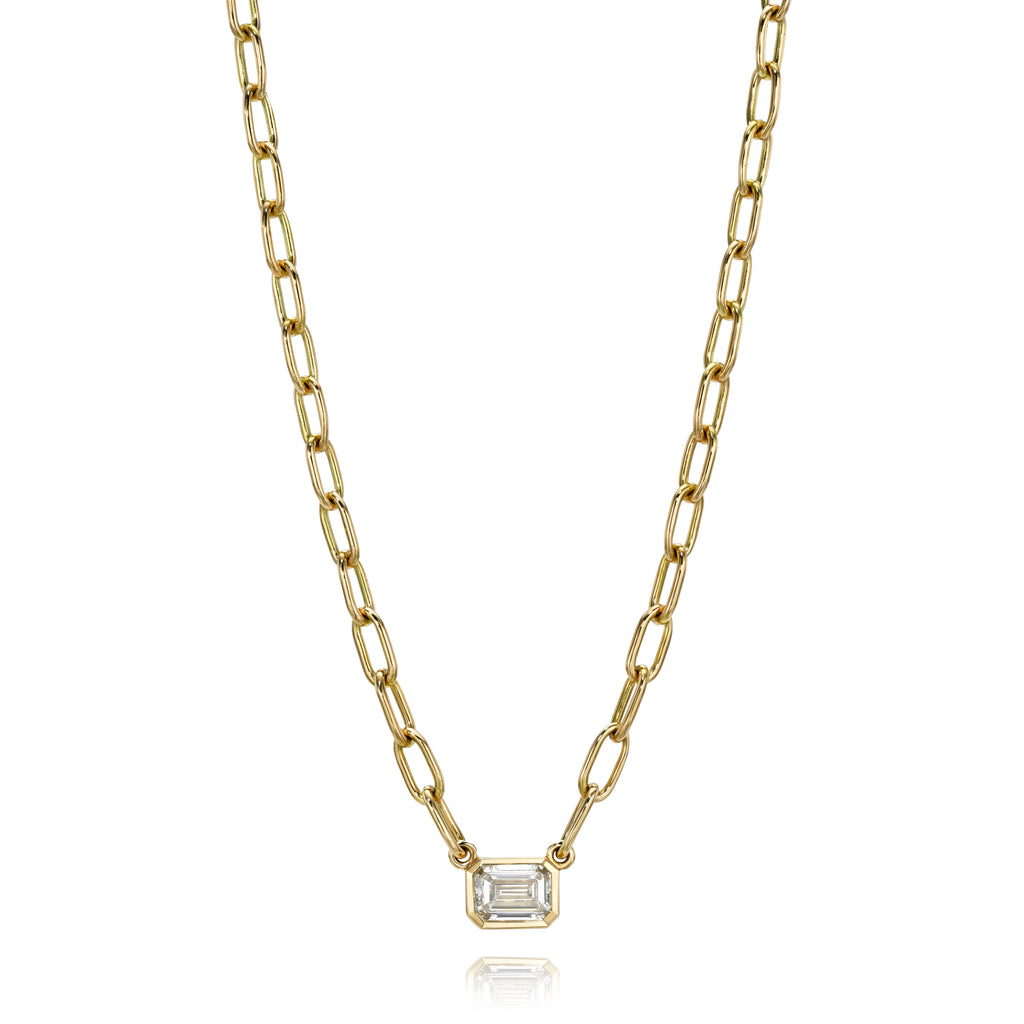 
Single Stone's Teddi necklace earrings  featuring 0.71ct S-T/VVS2 GIA certified emerald cut diamond bezel set on our handcrafted 18K yellow gold Bond chain.
Necklace measures 17".


