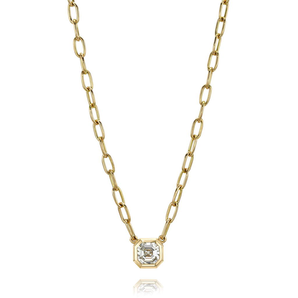 
Single Stone's Teddi necklace band  featuring 1.20ct L/VS2 GIA certified Asscher cut diamond bezel set on out handcrafted 18K yellow gold Bond chain.
Necklace measures 17".

