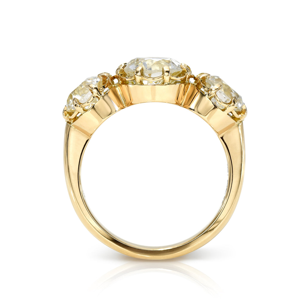Single Stone's THREE STONE JOLENE ring  featuring 3.31ctw J-K/VS1-VS2 GIA certified old European cut diamonds prong set in a handcrafted 18K yellow gold mounting.
