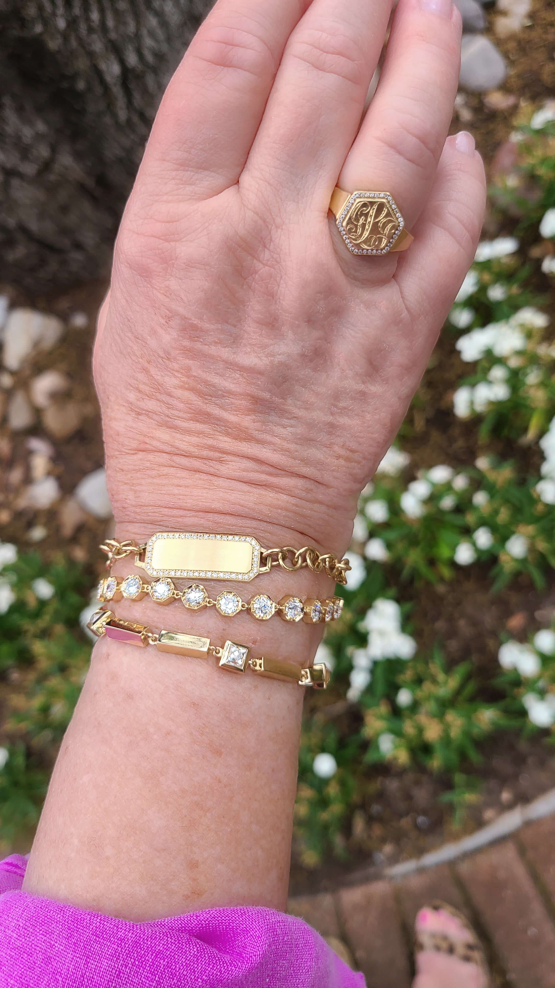 Close up of bracelets Terilynn is wearing from the Single Stone vintage-inspired jewelry collection
