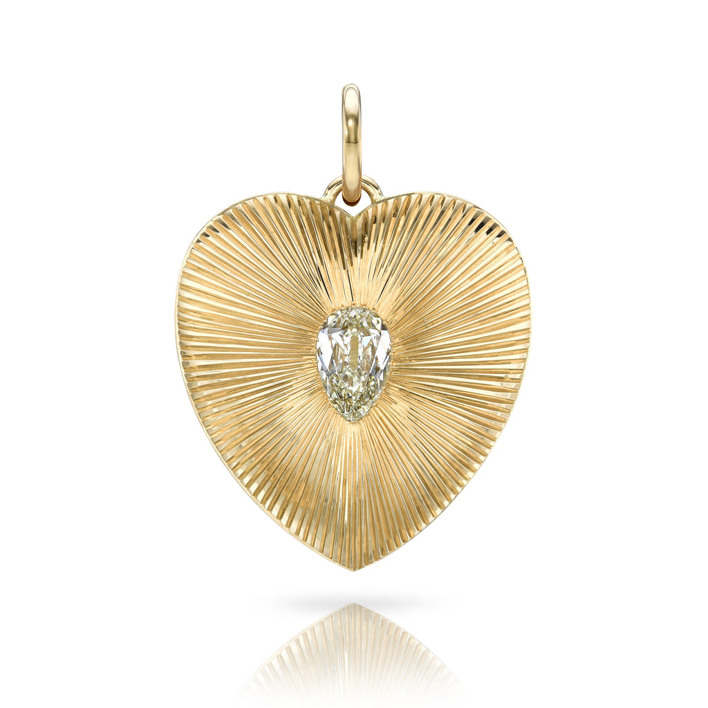 
Single Stone's Valentina pendant  featuring 2.00ct L/SI1 GIA certified pear shape diamond prong set in a handcrafted 18K yellow gold heart-shaped pendant,
Price does not include chain.
