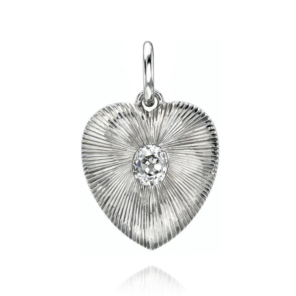 
Single Stone's Small valentina pendant  featuring 1.21ct K/VS2 GIA certified antique cushion cut diamond set in a handcrafted platinum heart-shaped pendant.
Price does not include chain.
