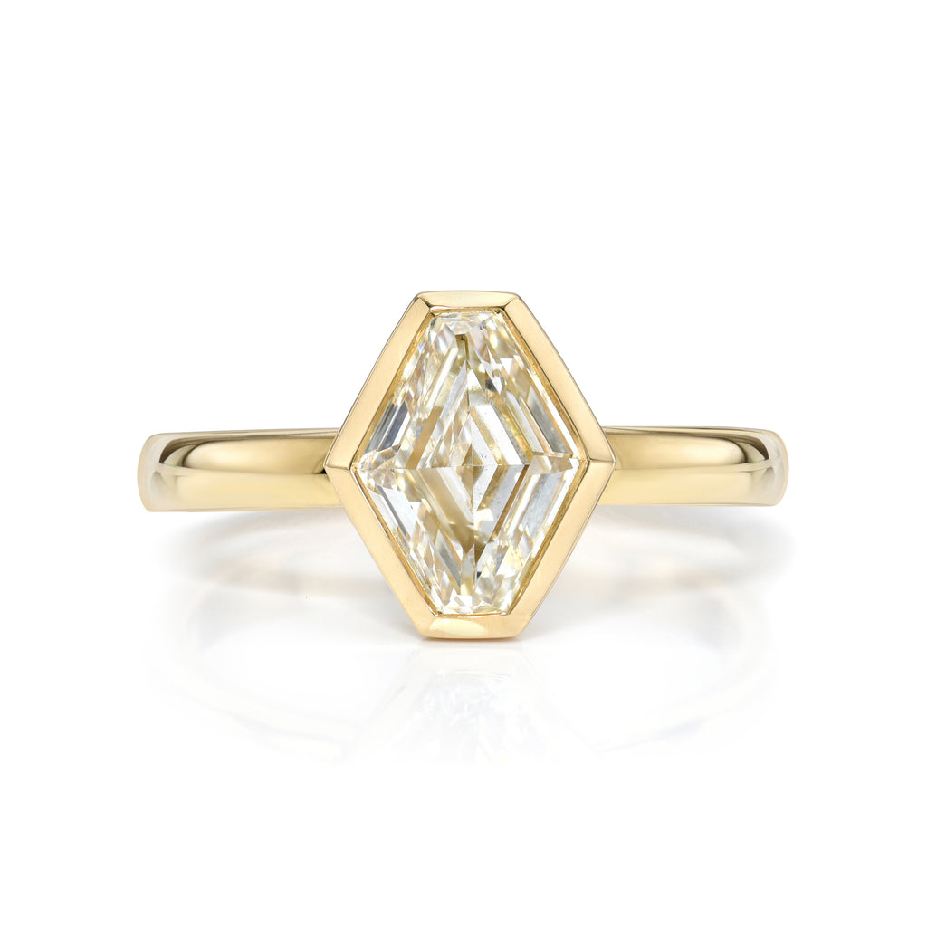
Single Stone's Wyler ring  featuring 1.40ct J/VS2 hexagonal step cut diamond bezel set in a handcrafted 18K yellow gold mounting.
