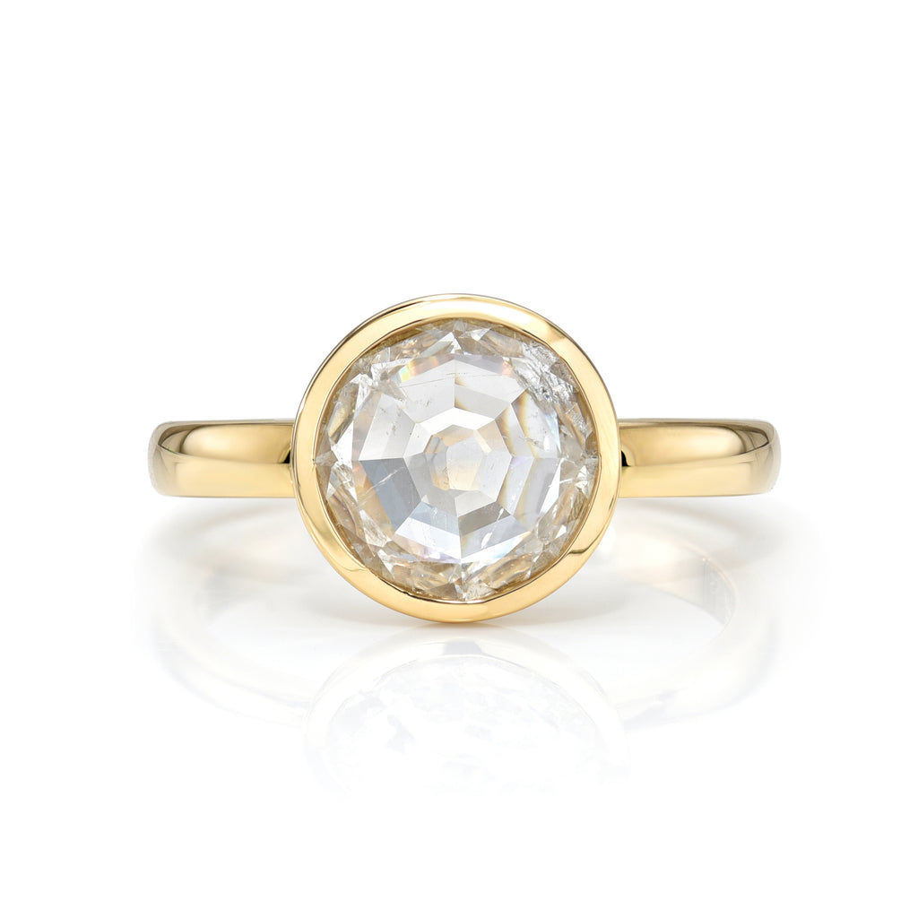 
Single Stone's Wyler ring  featuring 1.73ct G/I2 GIA certified round rose cut diamond bezel set in a handcrafted 18K yellow gold mounting.
