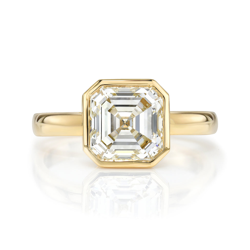 
Single Stone's Wyler ring  featuring 2.21ct M/VVS1 certified Asscher cut diamond bezel set in a handcrafted 18K yellow gold mounting.

