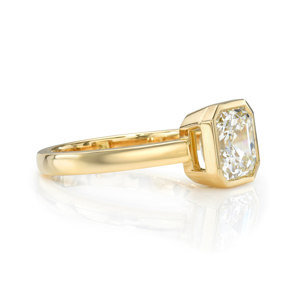 Single Stone's WYLER ring  featuring 2.21ct M/VVS1 certified Asscher cut diamond bezel set in a handcrafted 18K yellow gold mounting.
