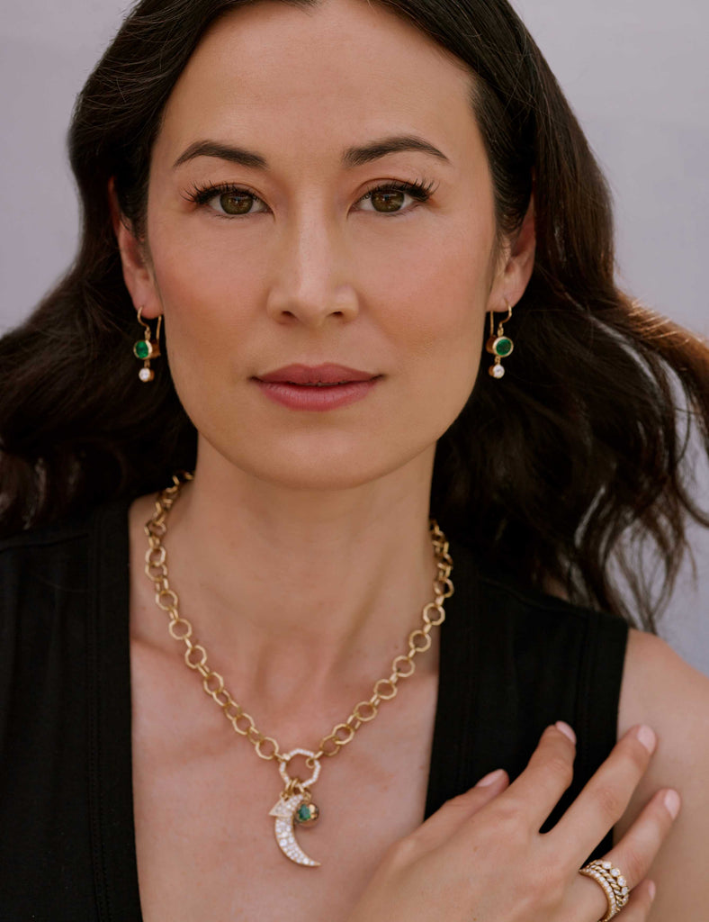 Model wearing selection of SIngle Stone jewelry