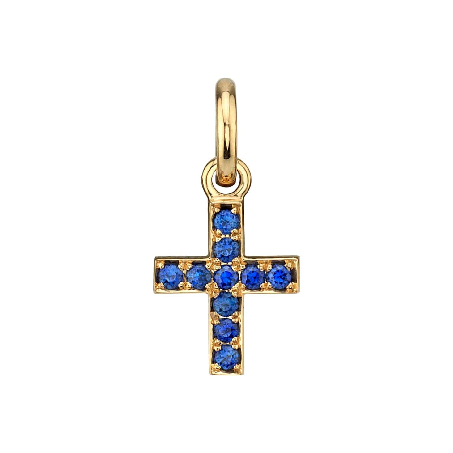 SINGLE STONE MINI CARMELA CROSS WITH GEMSTONES PENDANT featuring Approximately 0.15ctw round cut gemstones prong set in a handcrafted 18K yellow gold cross. Cross measures 8.20mm x 9.80mm. Price does not include chain.