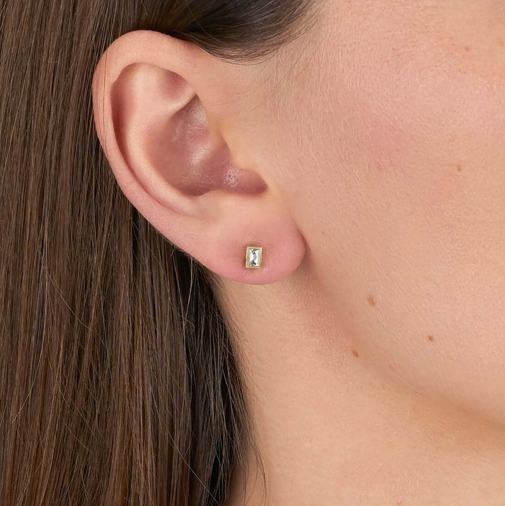 Single Stone's ESME STUDS earrings  featuring Approximately 0.20ctw French cut diamonds bezel set in handcrafted stud earrings.
