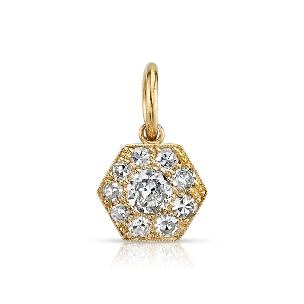 
Single Stone's Hexagonal cobblestone charm pendant  featuring Approximately 0.25ctw varying old cut and round brilliant cut diamonds set in a handcrafted 18K yellow gold pendant. Prices vary according to diamond weight. Price does not include chain. Charm measures 8mm x 7mm.
*Cobblestone pattern may vary from piece to piece

