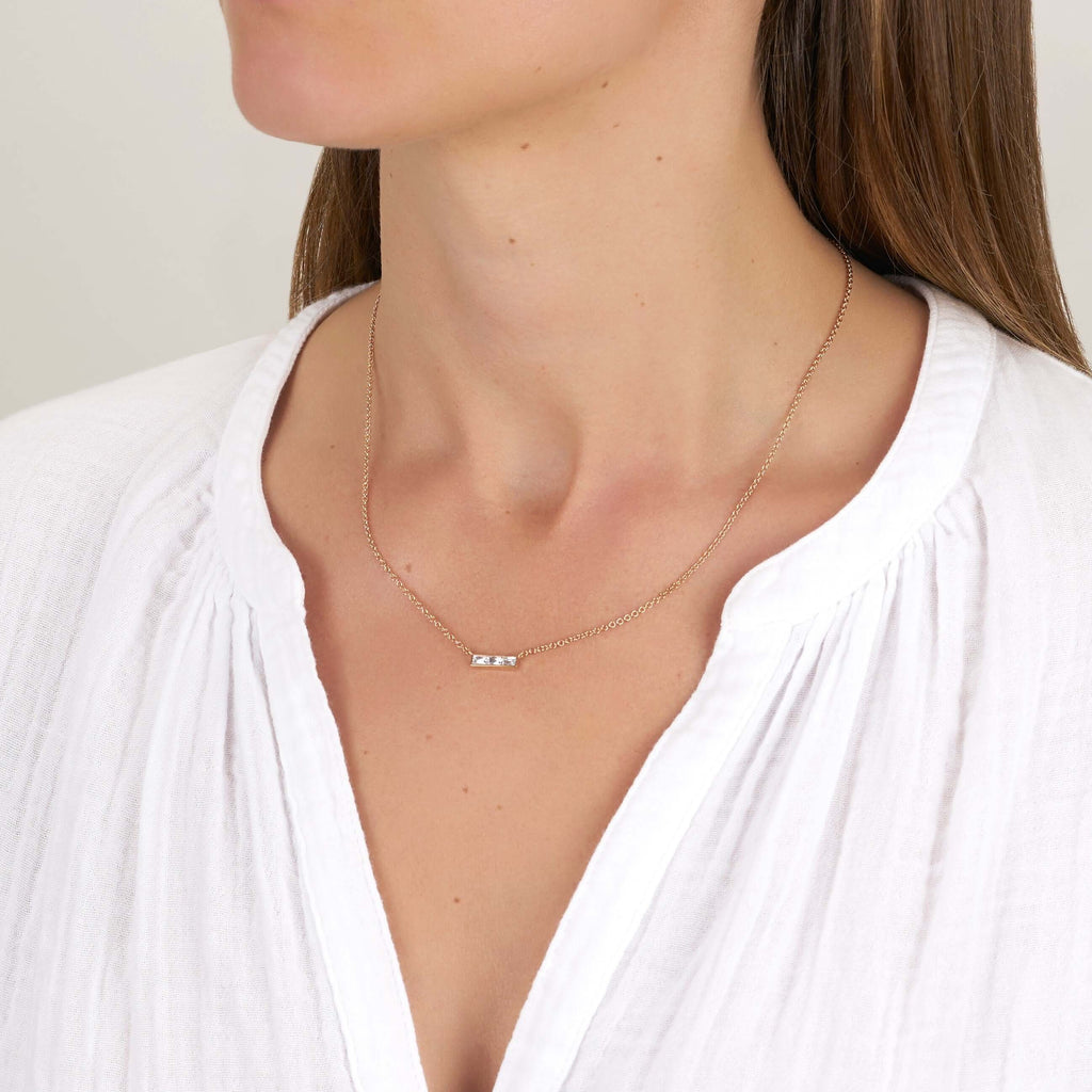 Single Stone's MONET NECKLACE  featuring Approximately 0.40ctw G-H/VS French cut diamonds set in a handcrafted bar pendant. Necklace measures 17&quot;. 
