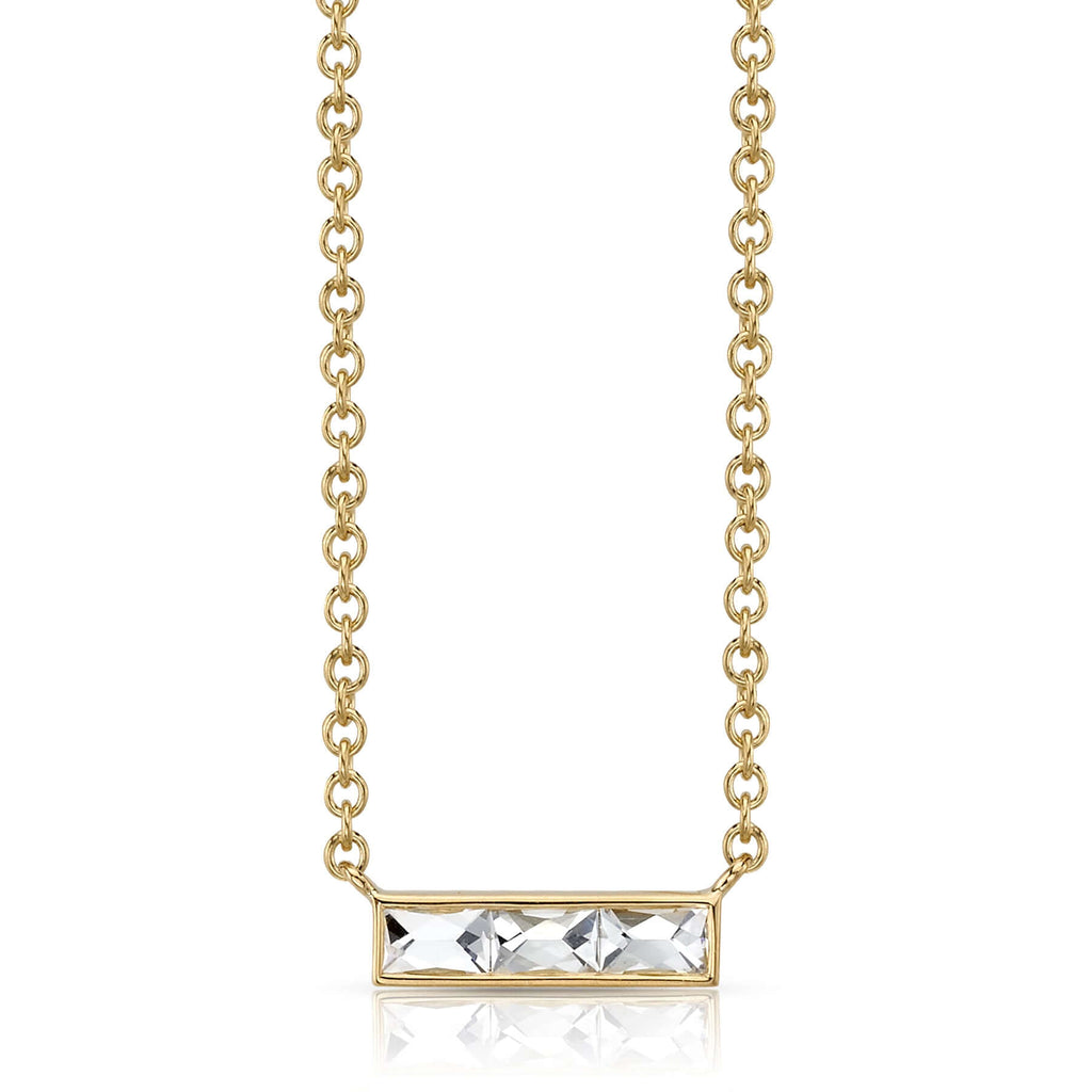 
Single Stone's Monet necklace earrings  featuring Approximately 0.40ctw G-H/VS French cut diamonds set in a handcrafted bar pendant. Necklace measures 17". 
