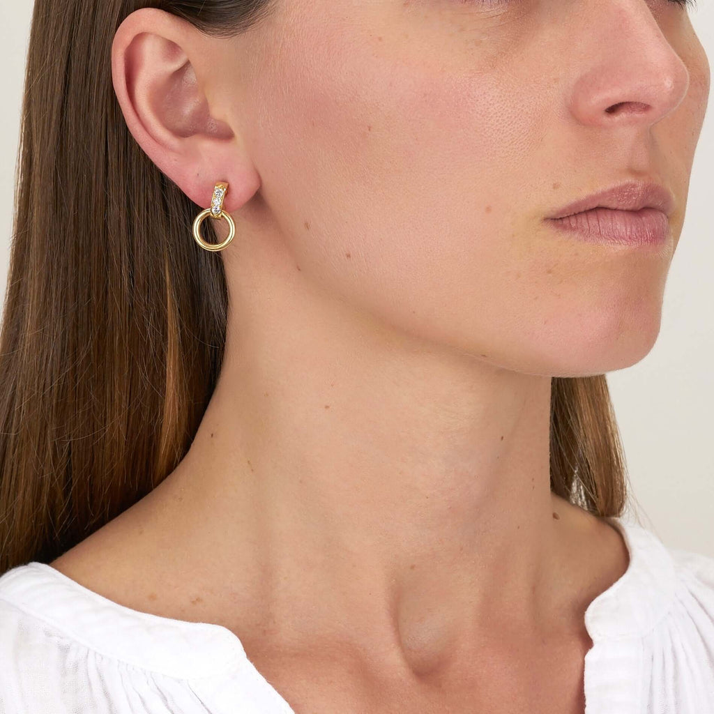 Single Stone's ASTRID HOOP earrings  featuring Approximately 0.35ctw G-H/VS old European cut diamonds prong set in 18K yellow gold hoop earrings. 
