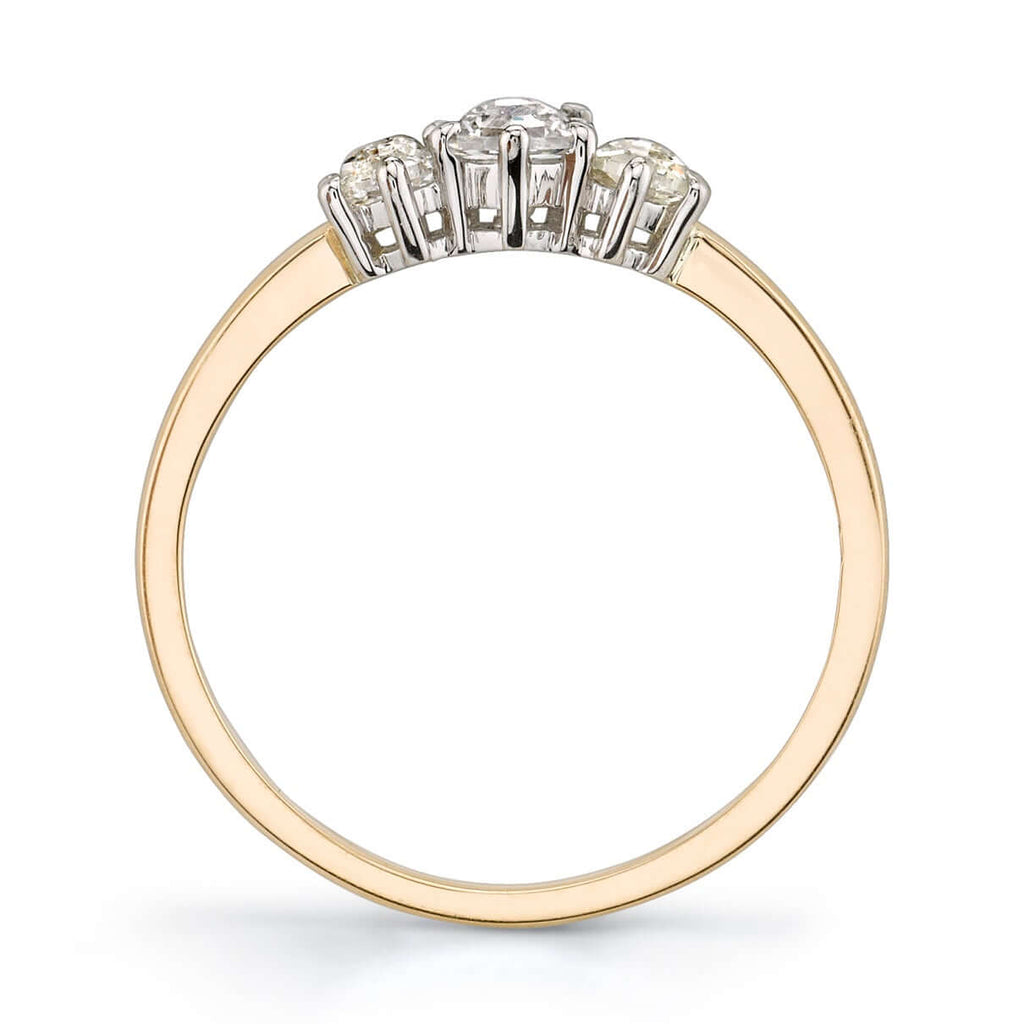Single Stone's QUINCY ring  featuring 0.42ctw hexagonal rose cut diamonds prong set in a handcrafted 18K yellow gold and platinum three stone mounting.
