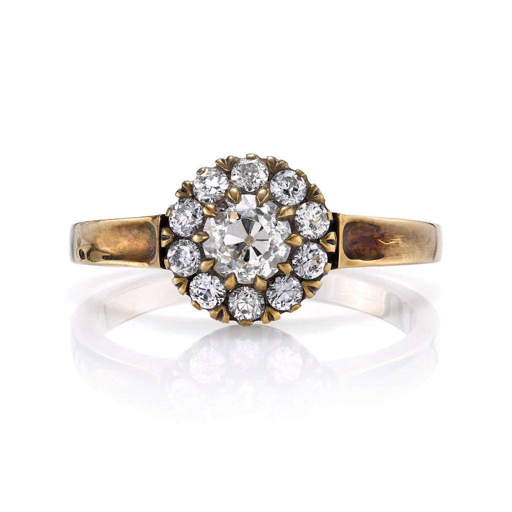 Single Stone's TALIA ring  featuring 0.47ct L-M/VS antique old mine cut diamond with 0.35ctw old European cut accent diamonds set in a handcrafted oxidized 18K yellow and champagne gold mounting.
