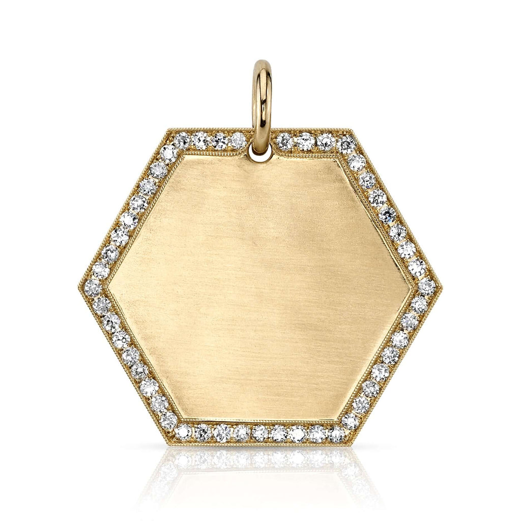 
Single Stone's Josephine pavé 30mm pendant  featuring Handcrafted 30mm 18K yellow gold engravable hexagon disc with approximately 0.45ctw G-H/VS old European cut pavé set diamonds.
Price includes monogrammed engraving of up to three letters in any of the styles shown above - please be sure to specify before placing your order. Please contact us to inquire about additional customization.
Price does not include chain. 
