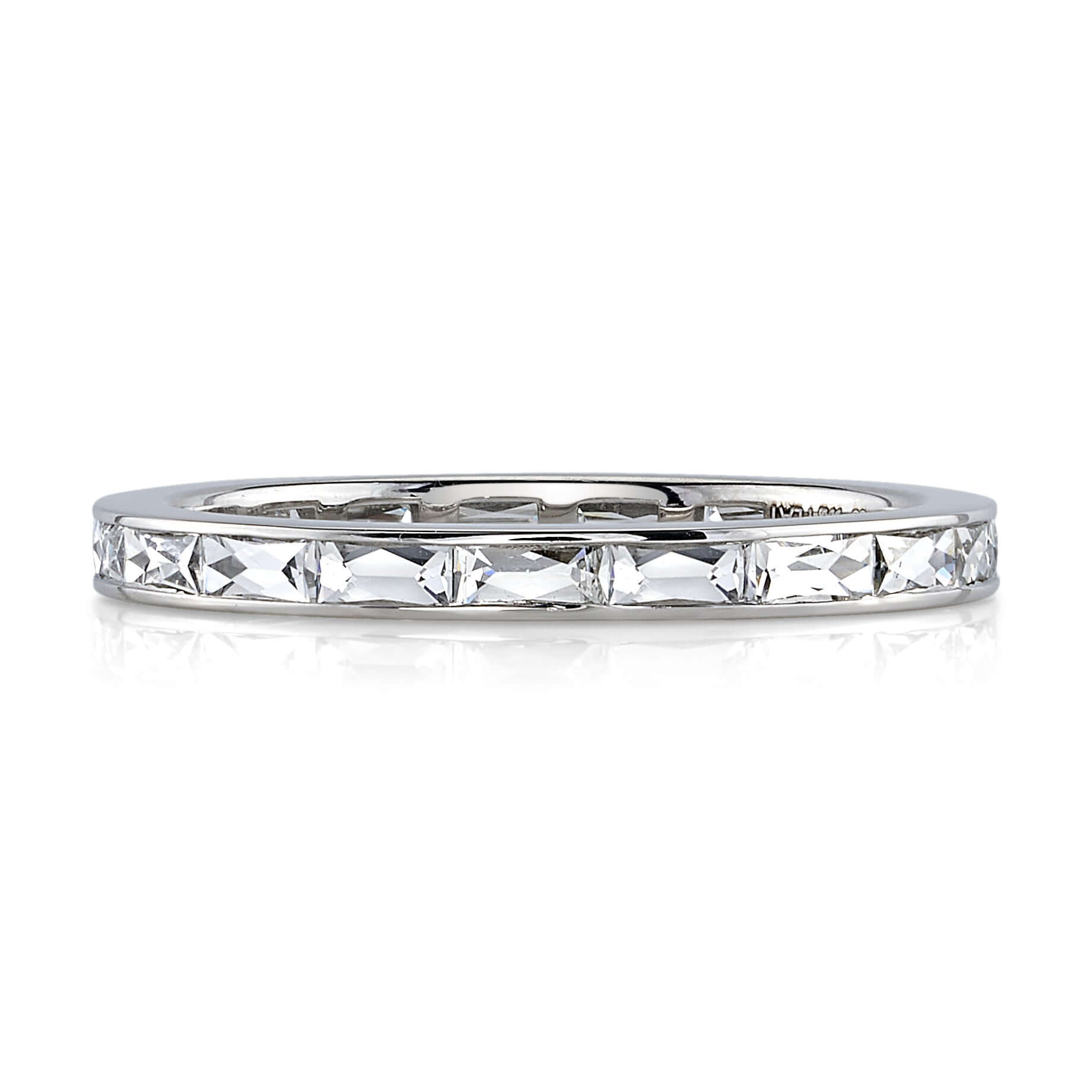 SINGLE STONE EMMA BAND | Approximately 0.90ctw G-H/VS French cut diamonds channel set in a handcrafted eternity band. Approximate band width 2mm. Please inquire for additional customization.