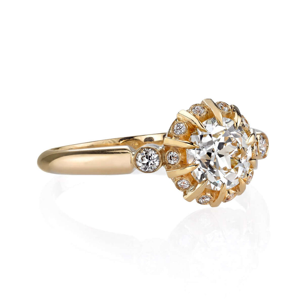 Single Stone's LEILANI ring  featuring 0.93ct J/VS2 GIA certified old European cut diamond with 0.11ctw old European cut diamond accents set in a handcrafted 18K yellow gold mounting.
