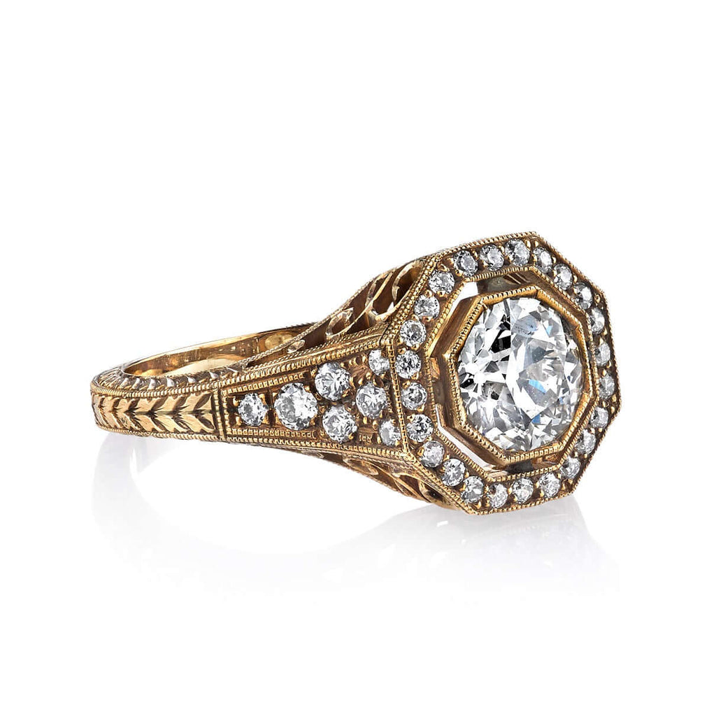 Single Stone's MCKENNA ring  featuring 0.97ct J/SI2 EGL certified old European cut diamond with 0.36ctw old European cut accent diamonds set in a handcrafted oxidized 18K yellow gold mounting.
