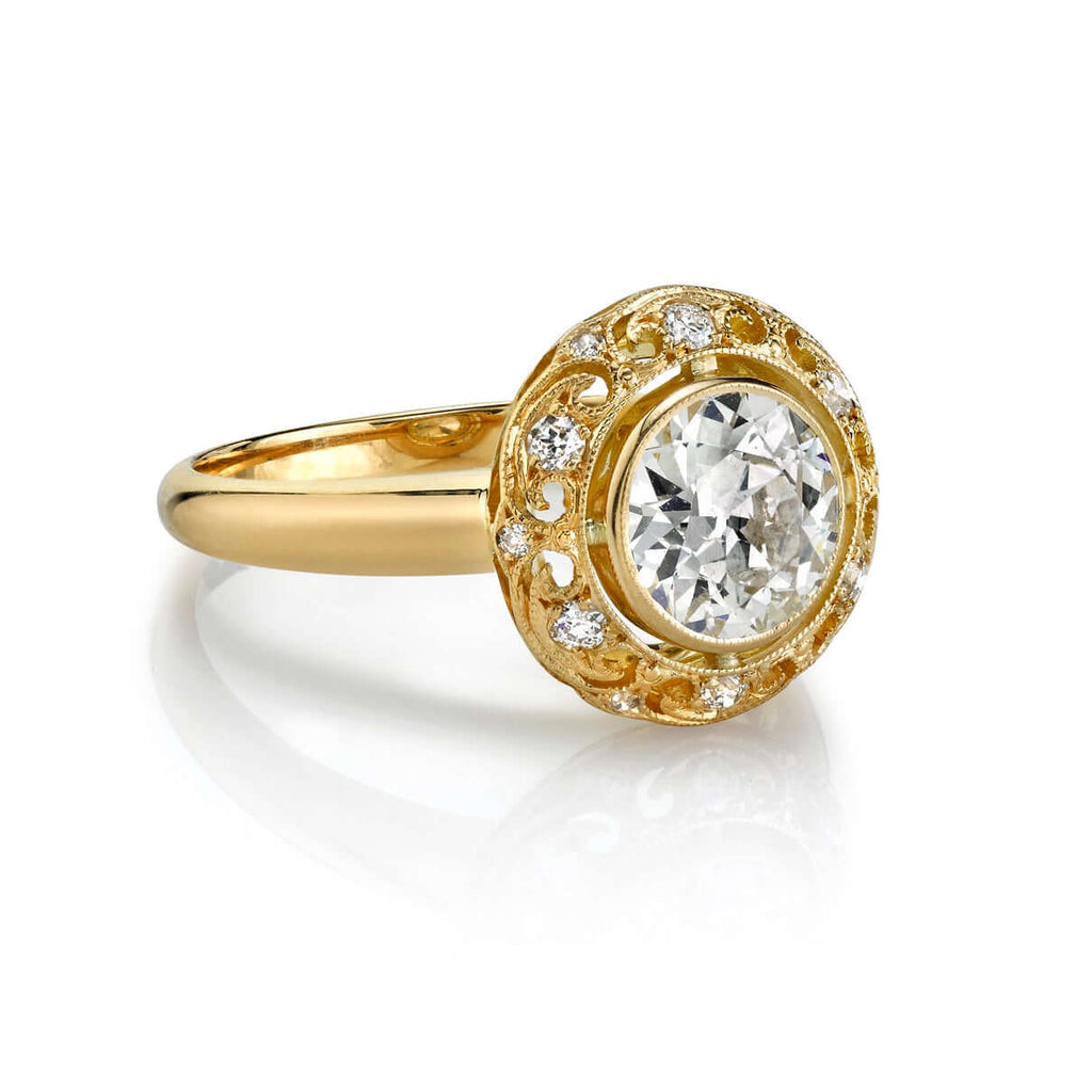Single Stone's CAPRI ring  featuring 1.06ct K/SI1 GIA certified old European cut diamond with 0.11ctw old European cut accent diamonds set in a handcrafted 18K yellow gold mounting.
