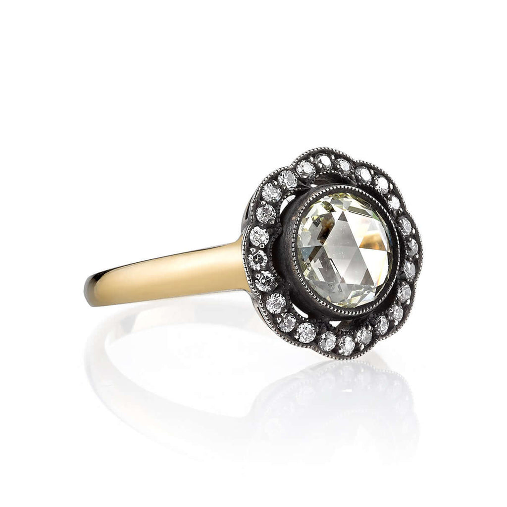 Single Stone's CHARLEY ring  featuring 1.17ct M/VS rose cut diamond with 0.22ctw old European cut accent diamonds set in a handcrafted 18K yellow gold and oxidized sterling silver mounting.
