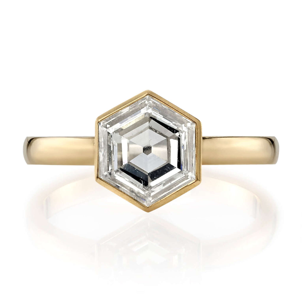 Single Stone's WYLER ring  featuring 1.18ct L/VS2 GIA certified hexagonal cut diamond set in a handcrafted 18K yellow gold mounting.

