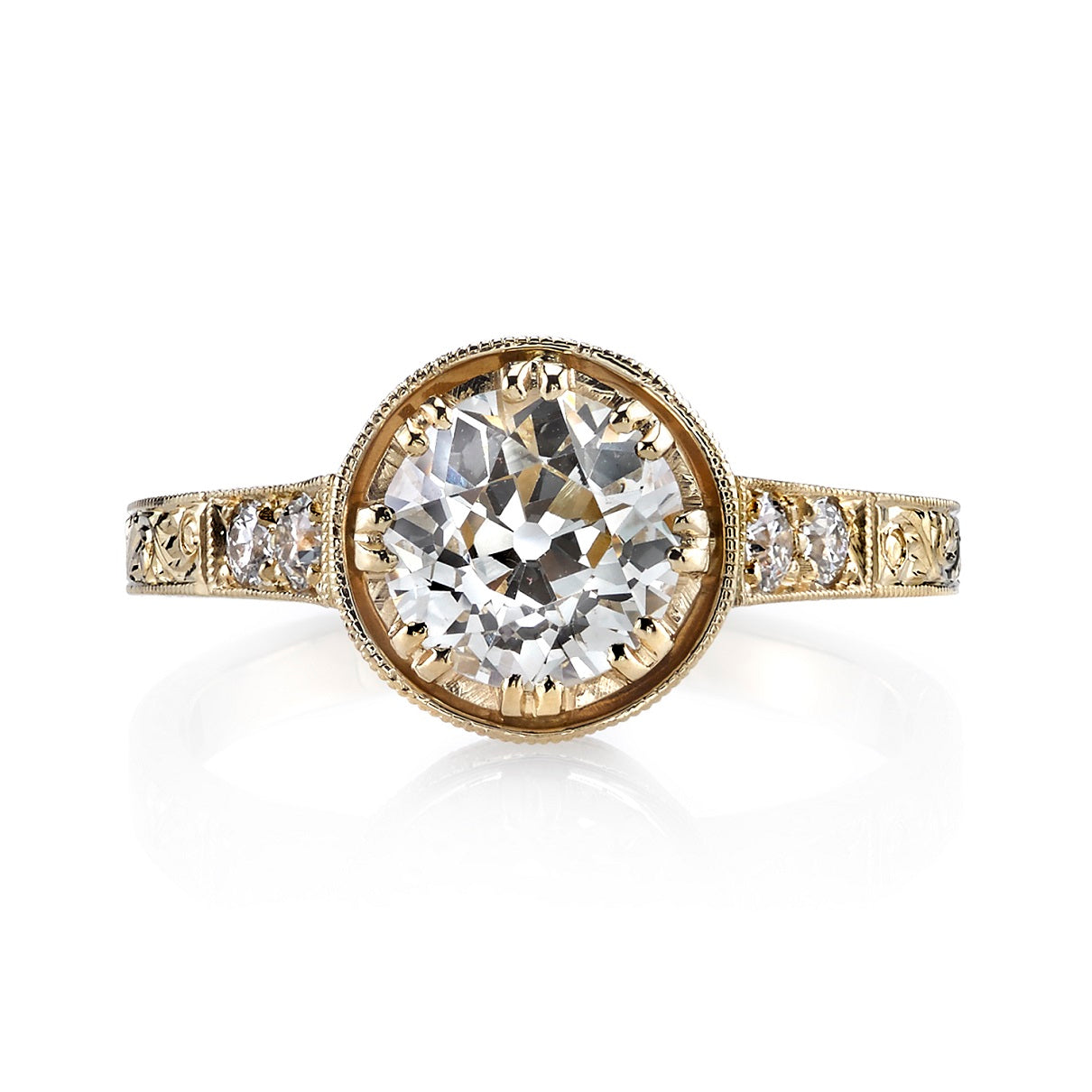 SINGLE STONE AUBREY RING featuring 1.20ct J/VS2 EGL certified old European cut diamond with 0.13ctw old European cut accent diamonds set in a handcrafted 18K yellow gold mounting.