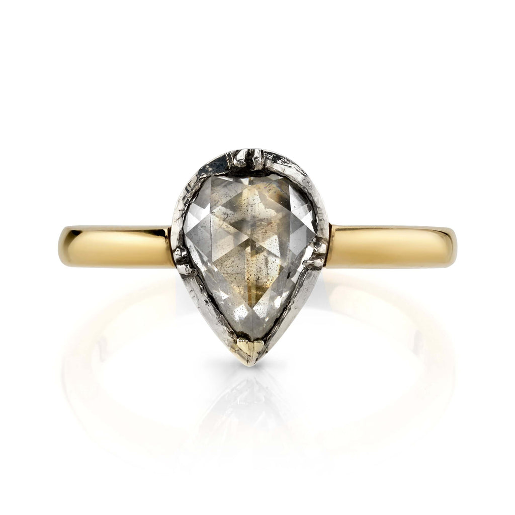Single Stone's JANIE ring  featuring 1.25ctw J-K/SI1 antique pear shaped rose cut diamond set in a handcrafted 18K yellow gold and oxidized sterling silver mounting.
