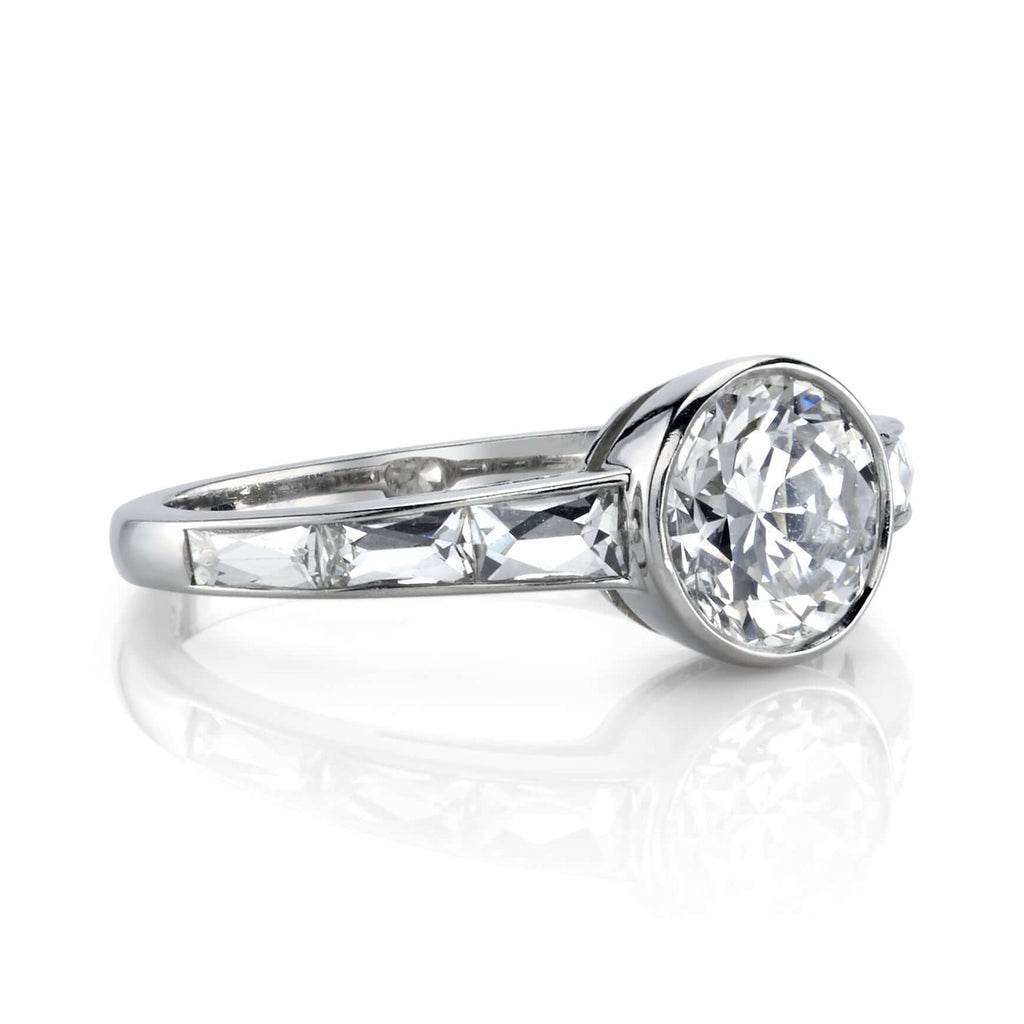 Single Stone's CHRISTINA ring  featuring 1.28ct I/VS1 EGL certified old European cut diamond with 0.56ctw French cut accent diamonds bezel set in a handcrafted platinum mounting.
