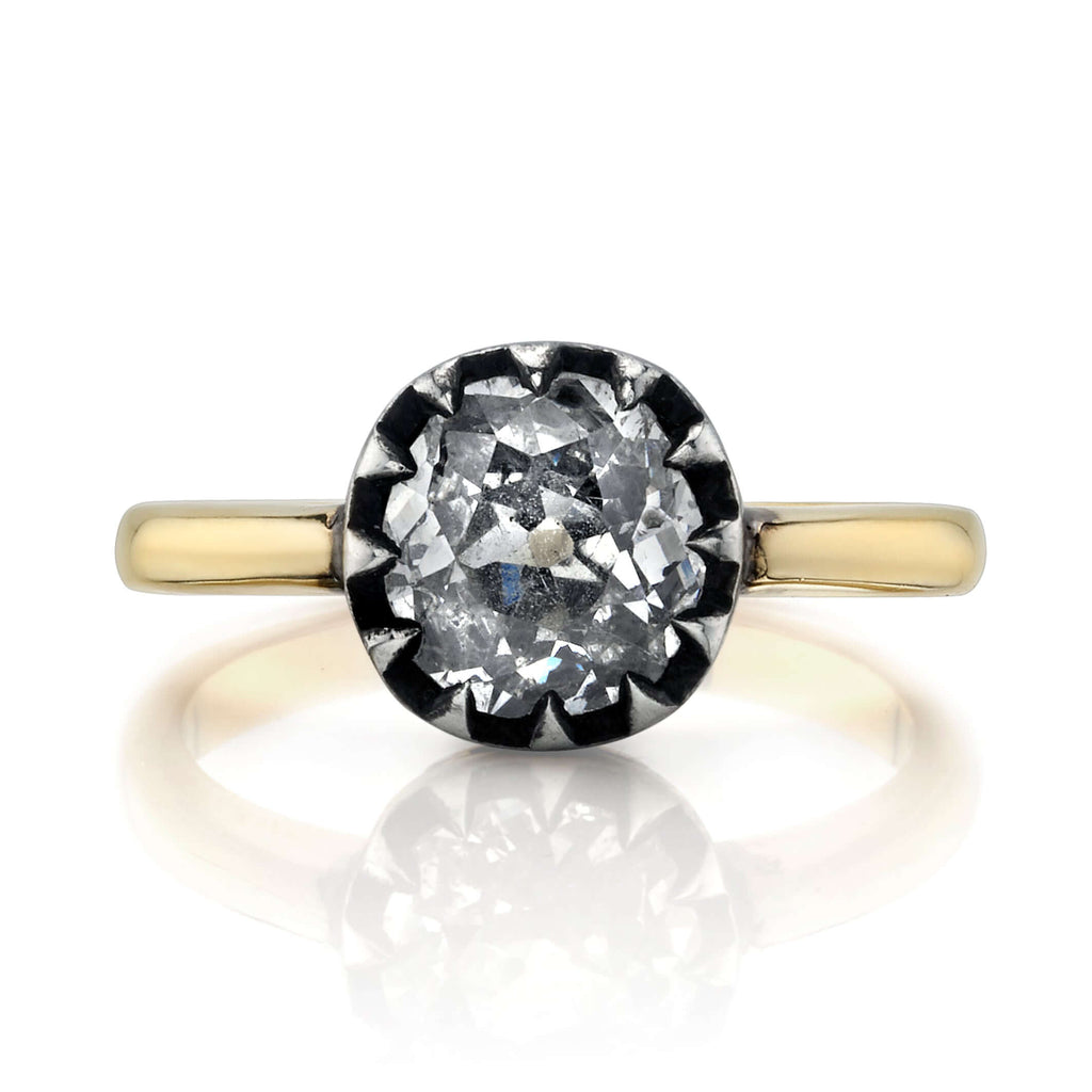 
Single Stone's Angelina ring  featuring 1.35ct H/SI2 EGL certified antique old mine cut diamond prong set in a handcrafted 18K yellow gold and oxidized silver mounting.


