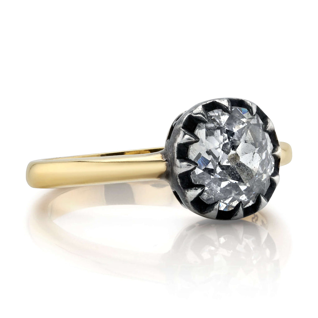 Single Stone's ANGELINA ring  featuring 1.35ct H/SI2 EGL certified antique old mine cut diamond prong set in a handcrafted 18K yellow gold and oxidized silver mounting.
