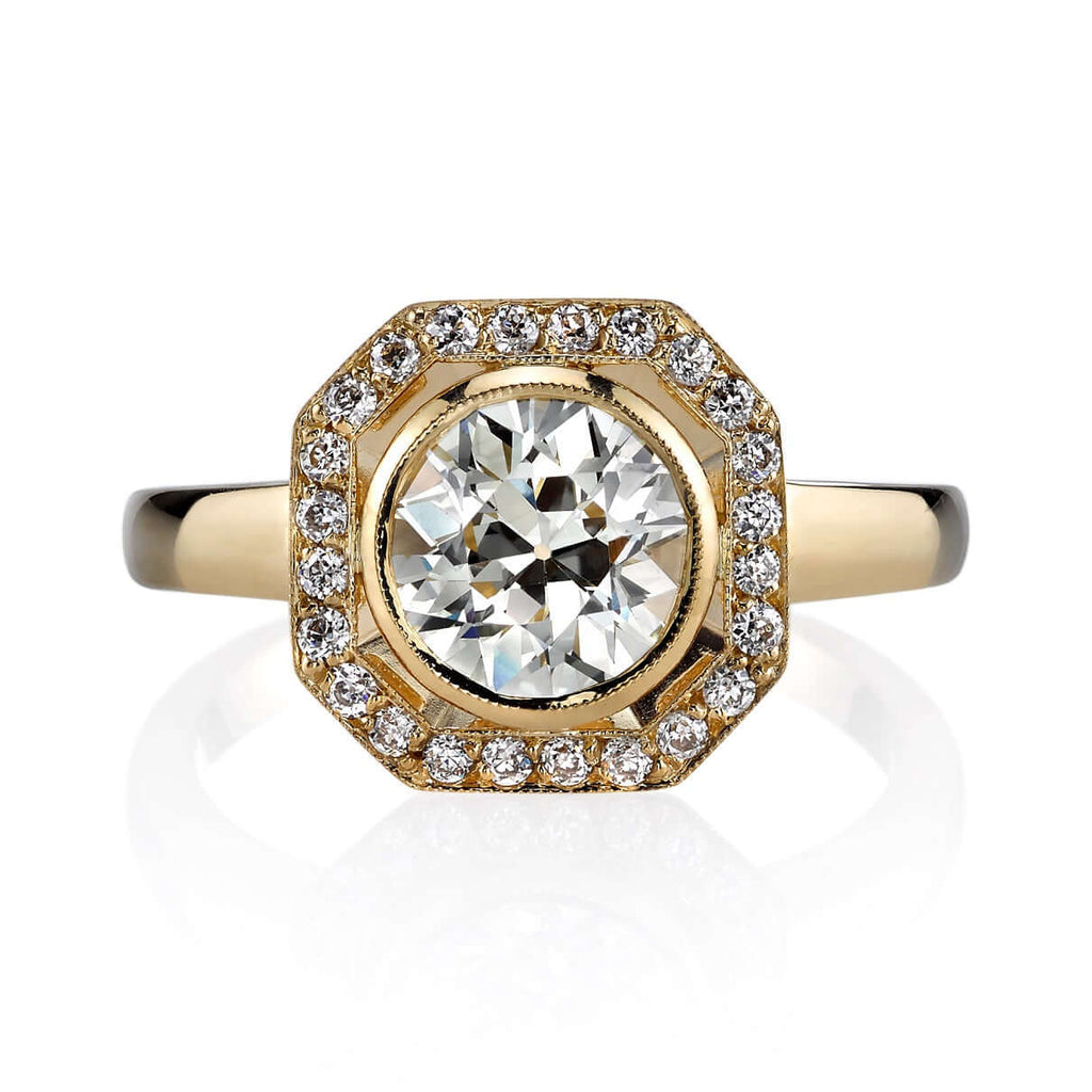 
Single Stone's Parker ring  featuring 1.33ct L/VS1 GIA certified old European cut diamond with 0.19ctw old European cut accent diamonds set in a handcrafted 18K yellow gold mounting.

