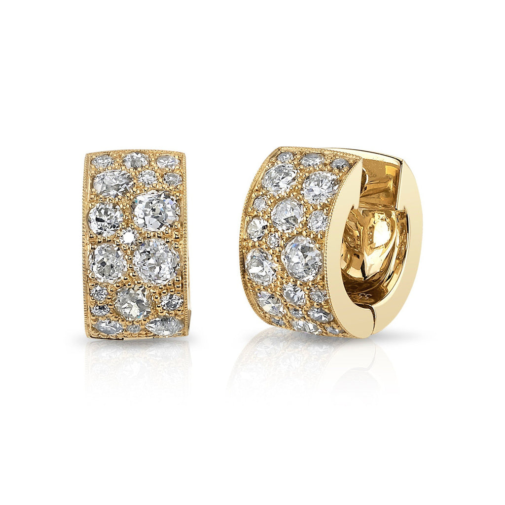 SINGLE STONE COBBLESTONE HUGGIES | Earrings featuring Approximately 1.40ctw - 1.60ctw varying old cut and round brilliant cut diamonds set in handcrafted 18k yellow gold huggie earrings. Price may vary according to diamond weight. *Cobblestone pattern may
