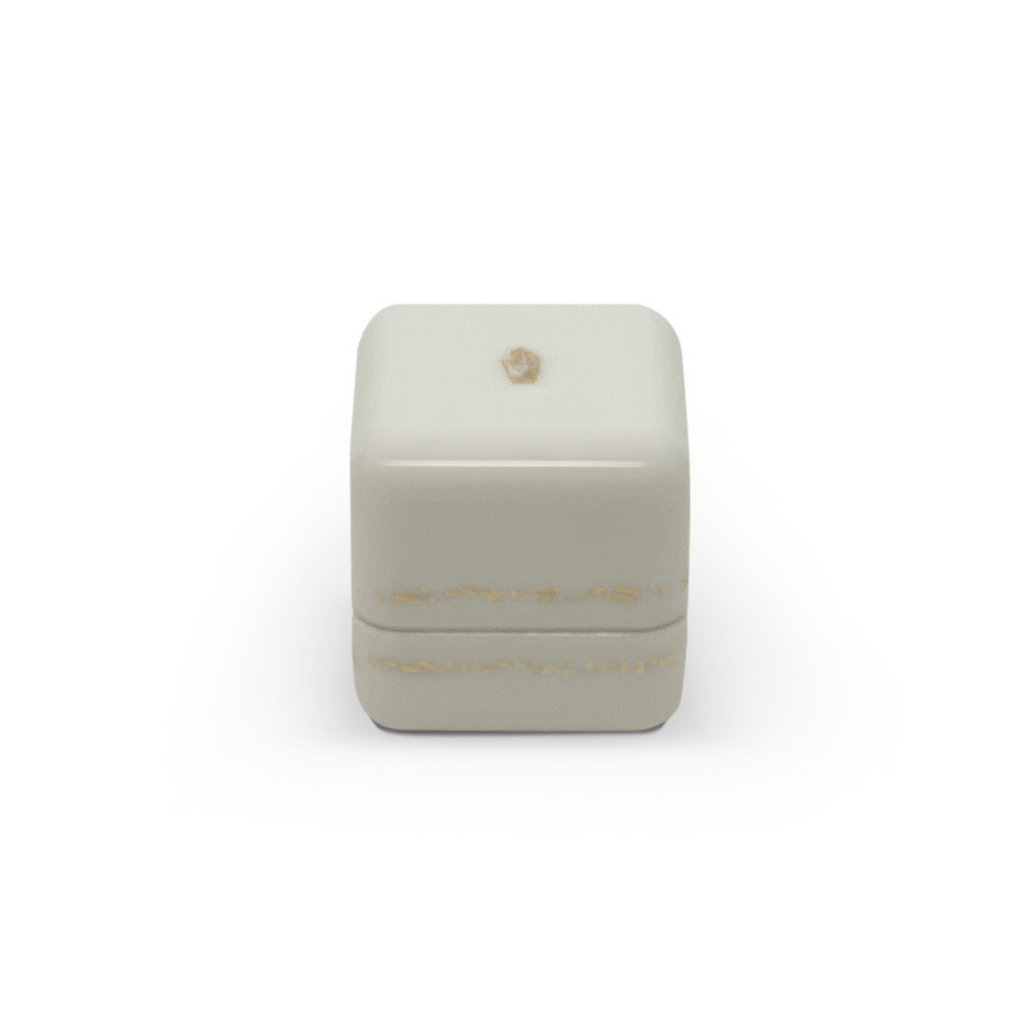 
Single Stone's Will you single ring box - white  featuring 
Wood with high gloss finish
Features delicate gold effect inlay
Brass plated hardware
Faux suede interior
48mm wide, 48mm deep, 55mm high

