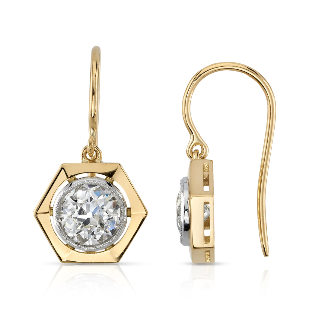 
Single Stone's Tisha drops earrings  featuring 2.04ctw J-K/SI2-I1 GIA certified old European cut diamonds bezel set in handcrafted 18K yellow gold and platinum drop earrings.

