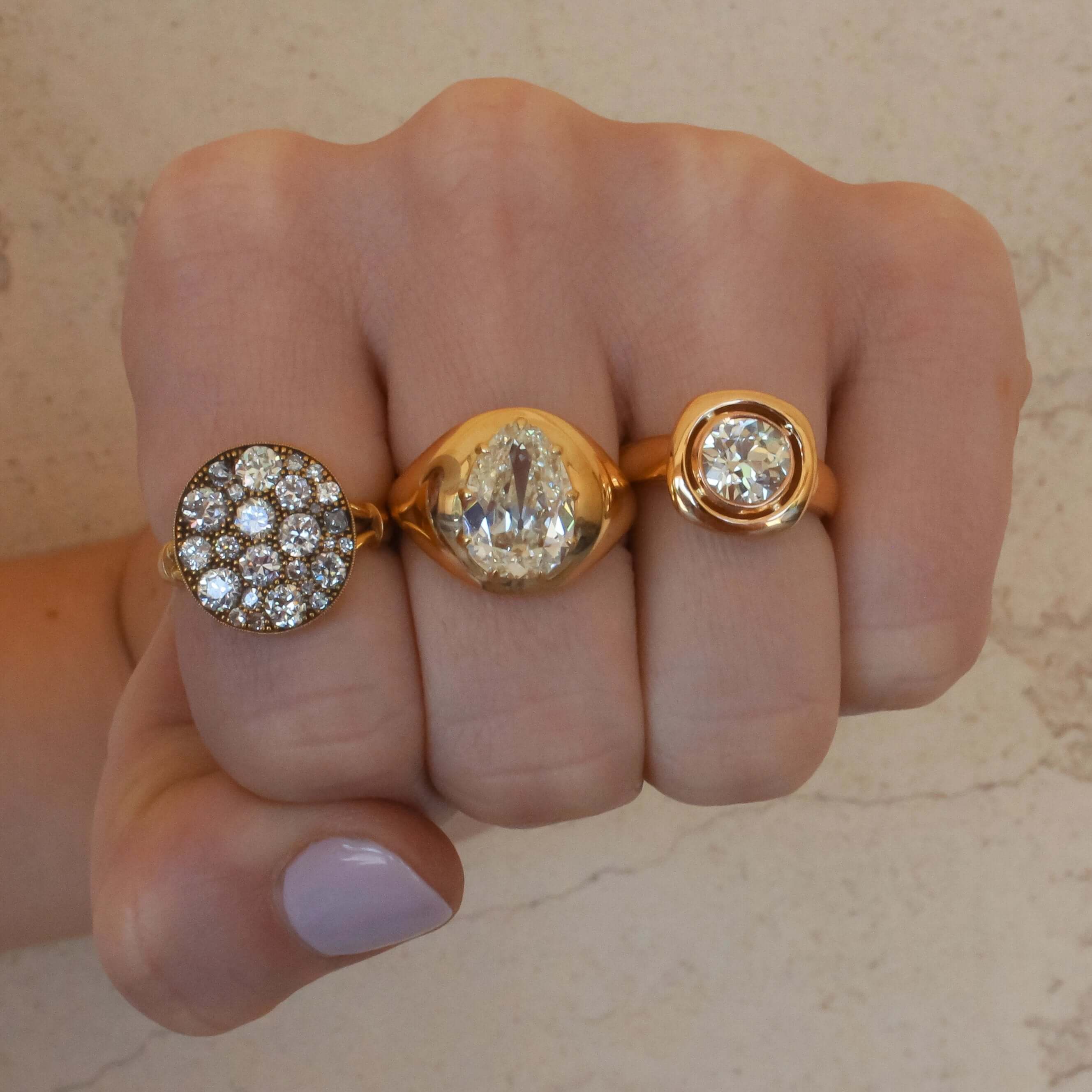 SINGLE STONE COBBLESTONE CRUX RING featuring 2.42ctw varying old cut and round brilliant cut diamonds set in a handcrafted, oxidized 18K yellow gold mounting. Price may vary according to total diamond weight. *Cobblestone pattern may vary from piece to pi
