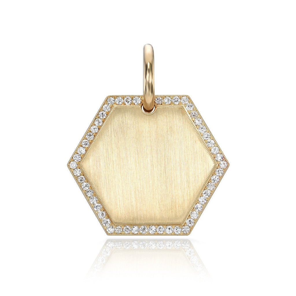 Single Stone's JOSEPHINE PAVÉ 25MM pendant  featuring Handcrafted 25mm 18K yellow gold engravable hexagon disc with approximately 0.35ctw G-H/VS old European cut pavé set diamonds. Price includes monogrammed engraving of up to three letters in any of the styles shown above - please be sure to specify before placing your order. Please contact us to inquire about additional
