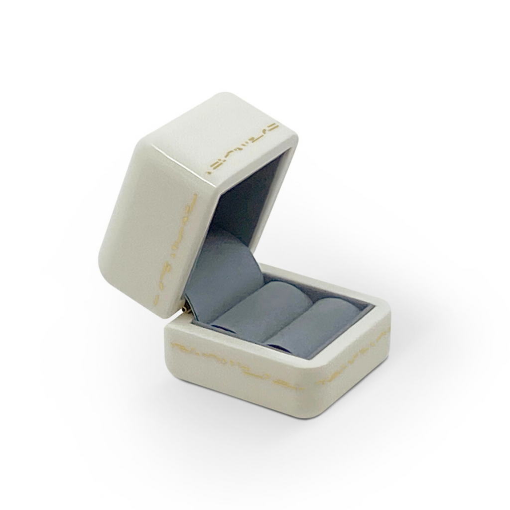Single Stone's WILL YOU SINGLE RING BOX - WHITE  featuring Wood with high gloss finish Features delicate gold effect inlay Brass plated hardware Faux suede interior 48mm wide, 48mm deep, 55mm high
